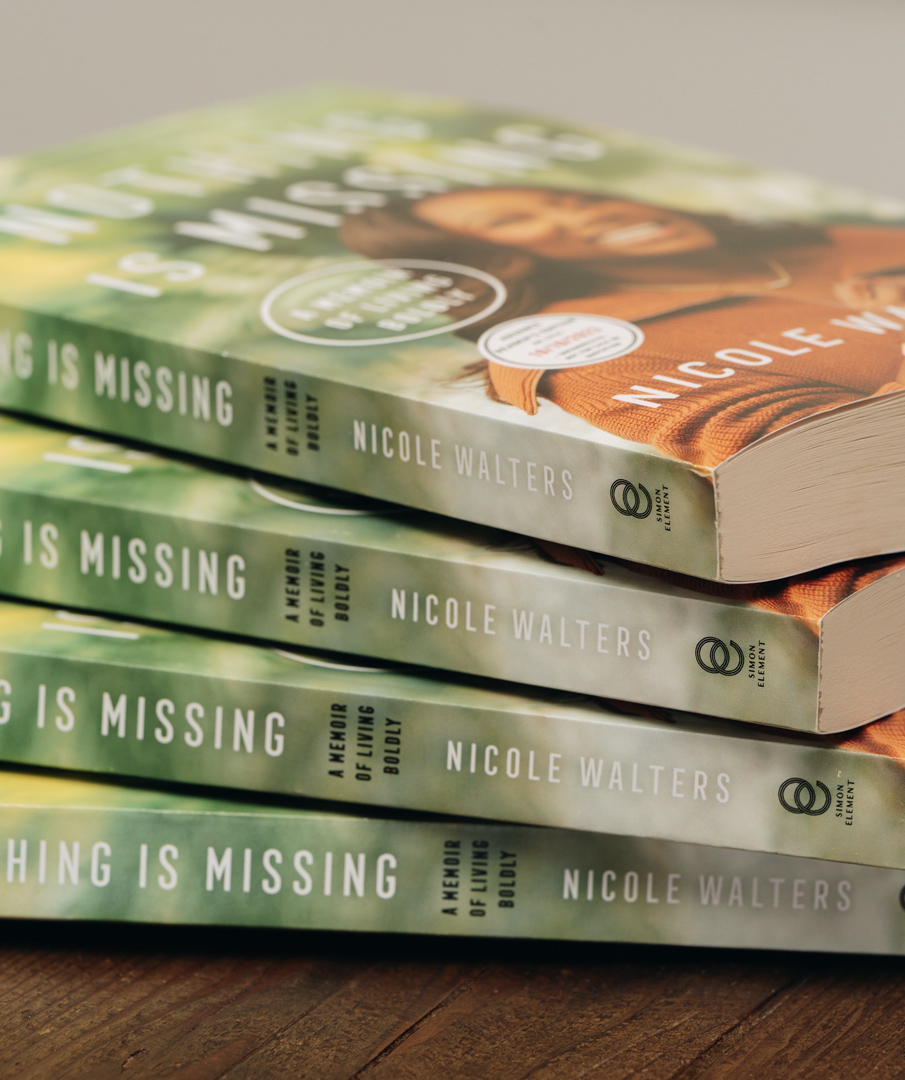 Stack of Nicole's books, "Nothing is Missing"